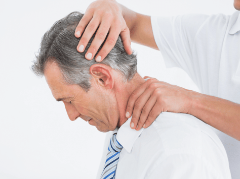 A man getting a neck adjustment after suffering whiplash