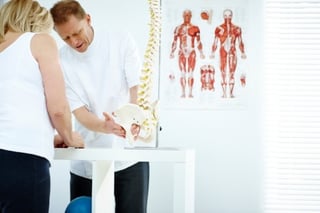 Car Accident Chiropractor in Englewood, Florida explaining injuries to a patient