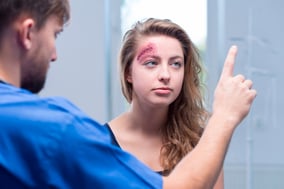 Car Accident Injury Doctor in Punta Gorda, Florida checking patient for concussion symptoms