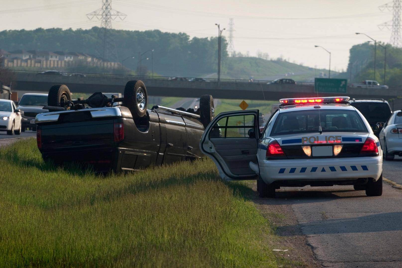 A truck that has flipped over after being in an accident in Brookhaven, Georgia